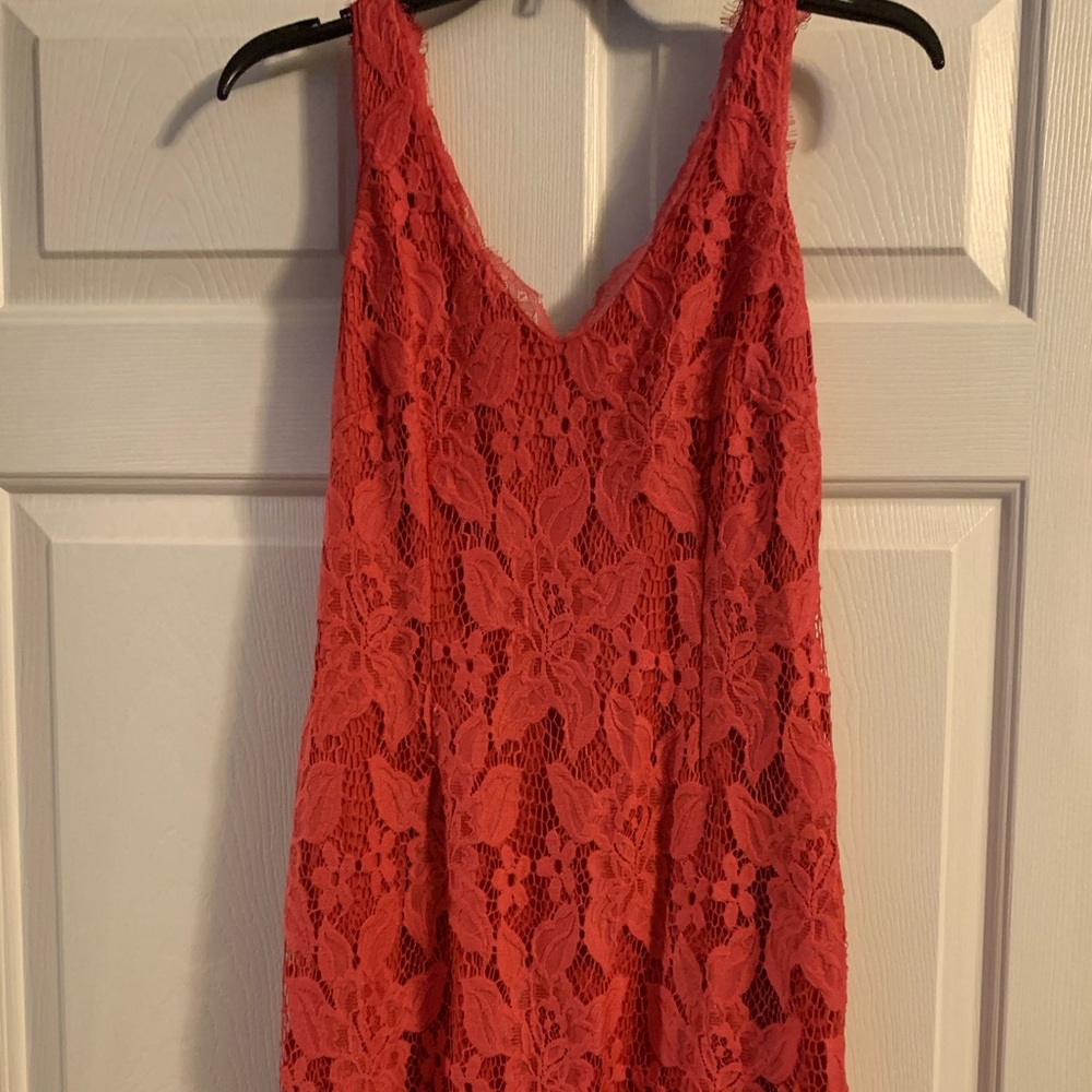 More pink or coral.  Very pretty comes above knee. Worn to a wedding